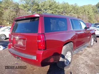 2017 Chevrolet Suburban LT with VIN 1GNSKHKC3HR311901, listed as a IAAI auction lot 40883429 with 141,325 mi miles. Bid and sale history available at carsss.com. Image 4.