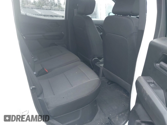 2023 Chevrolet Colorado 2WD Work Truck z VIN 1GCGSBECXP1210035, wystawiony jako IAAI lot #41906185 z przebiegiem 15 001 mil mil oraz . Historia ofert i sprzedaży dostępna na DreamBid. Obrazek 8.