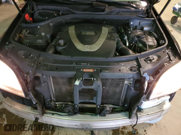 2008 Mercedes-Benz M 550 with VIN 4JGBB72E08A323275, listed as a Copart auction lot 47591665 with 157,076 mi miles and Salvage title. Bid and sale history available at DreamBid. Image 12.