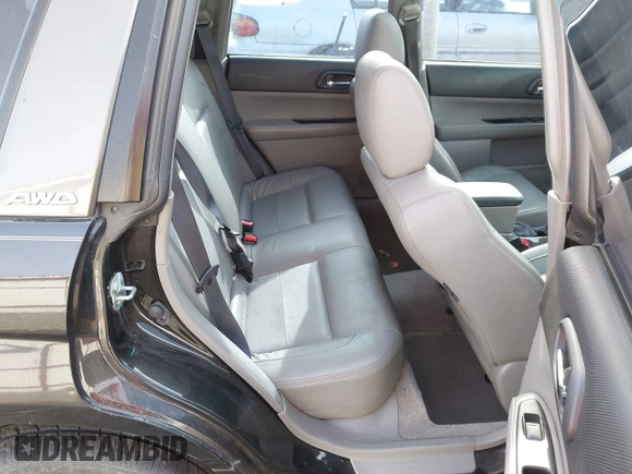 2003 Subaru Forester XS with VIN JF1SG65633H745258, listed as a IAAI auction lot 42014221 with 252,731 mi miles. Bid and sale history available at carsss.com. Image 8.