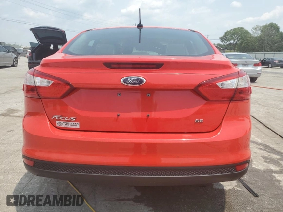 2012 Ford Focus SE with VIN 1FAHP3F22CL253922, listed as a Copart auction lot 59124055 with 112,421 mi miles and Salvage title. Bid and sale history available at DreamBid. Image 6.