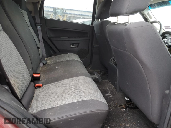 2010 Jeep Grand Cherokee Laredo with VIN 1J4PR4GKXAC120224, listed as a Copart auction lot 88764805 with 153,742 mi miles and Salvage Title. Bid and sale history available at carsss.com. Image 11.