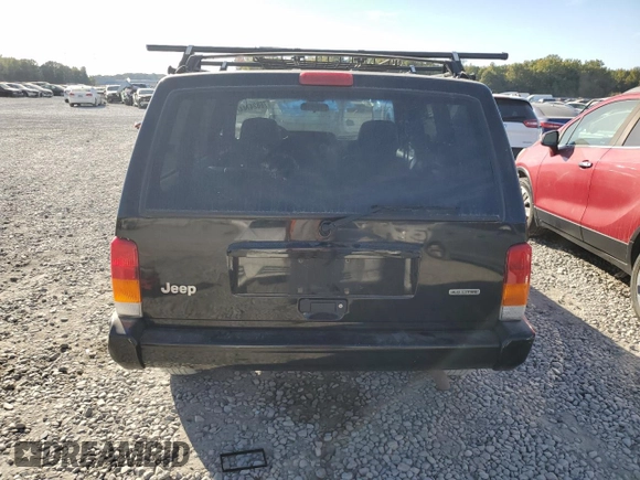 2001 Jeep Cherokee Sport z VIN 1J4FF58S61L612533, wystawiony jako Copart lot #76824714 z przebiegiem 62 401 mil mil oraz Szkoda całkowita • Salvage title. Historia ofert i sprzedaży dostępna na DreamBid. Obrazek 6.