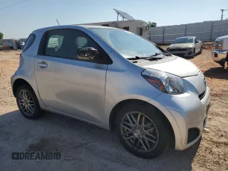 2012 Scion iQ with VIN JTNJJXB05CJ010539, listed as a Copart auction lot 56489245 with 114,623 mi miles and Salvage title. Bid and sale history available at DreamBid. Image 4.