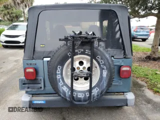 1998 Jeep Wrangler Sport with VIN 1J4FY19S9WP782841, listed as a Copart auction lot 75063524 with 0 mi miles and Non Repairable. Bid and sale history available at carsss.com. Image 6.