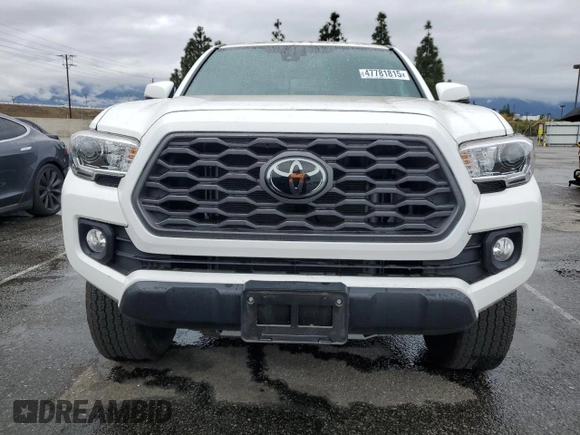 2021 Toyota Tacoma 4WD SR5 with VIN 3TMDZ5BN0MM114807, listed as a Copart auction lot 47781815 with 16,976 mi miles and Salvage Title. Bid and sale history available at carsss.com. Image 5.