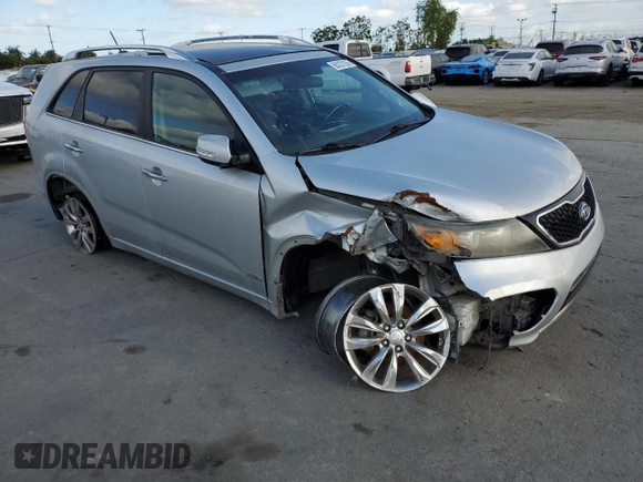 2012 Kia Sorento SX with VIN 5XYKWDA29CG302920, listed as a Copart auction lot 56237235 with 137,998 mi miles and Salvage title. Bid and sale history available at DreamBid. Image 4.