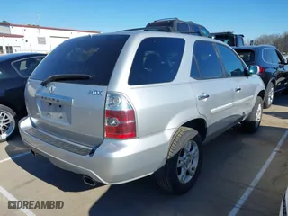 2005 Acura MDX Touring with VIN 2HNYD18655H536560, listed as a IAAI auction lot 41697056 with 145,150 mi miles. Bid and sale history available at carsss.com. Image 4.