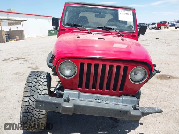 2000 Jeep Wrangler Sport with VIN 1J4FA49S0YP731544, listed as a IAAI auction lot 42570831 with Not provided miles and . Bid and sale history available at DreamBid. Image 13.