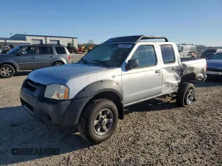 2001 Nissan Frontier SE z VIN 1N6ED27T41C316150, wystawiony jako Copart lot #87860385 z przebiegiem 217 739 mil mil oraz Szkoda całkowita • Salvage title. Historia ofert i sprzedaży dostępna na DreamBid. Obrazek 1.