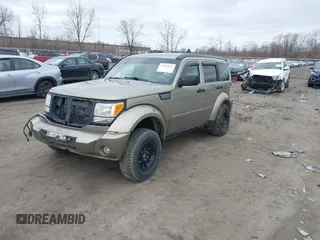 2007 Dodge Nitro SLT z VIN 1D8GU58K97W700047, wystawiony jako IAAI lot #41805822 z przebiegiem 186 604 mil mil oraz . Historia ofert i sprzedaży dostępna na DreamBid. Obrazek 2.
