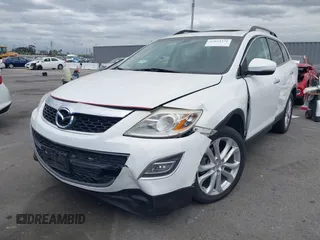 2012 Mazda CX-9 Grand Touring with VIN JM3TB2DV1C0365341, listed as a IAAI auction lot 42034276 with 141,725 mi miles and . Bid and sale history available at DreamBid. Image 6.