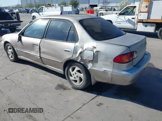 1999 Toyota Corolla VE z VIN 1NXBR18E6XZ225512, wystawiony jako IAAI lot #41842023 z przebiegiem 324 718 mil mil oraz . Historia ofert i sprzedaży dostępna na DreamBid. Obrazek 3.