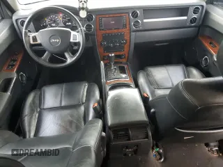 2010 Jeep Commander Limited with VIN 1J4RG5GT4AC146847, listed as a Copart auction lot 50259965 with 114,894 mi miles and Salvage title. Bid and sale history available at DreamBid. Image 8.