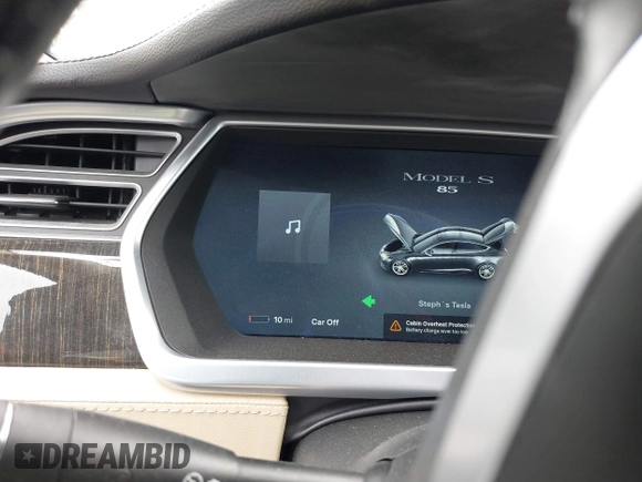 2013 Tesla Model S with VIN 5YJSA1CN8DFP21869, listed as a IAAI auction lot 41772603 with Not provided miles and . Bid and sale history available at DreamBid. Image 16.