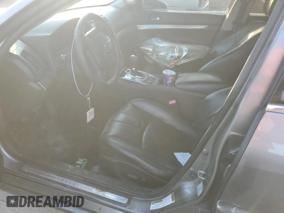 2015 Infiniti Q40 with VIN JN1CV6AR0FM650630, listed as a Copart auction lot 82579604 with 104,324 mi miles and Salvage Title. Bid and sale history available at carsss.com. Image 7.