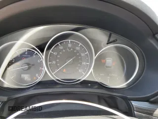 2018 Mazda CX-5 Grand Touring z VIN JM3KFBDM1J0473754, wystawiony jako Copart lot #60362245 z przebiegiem 72 792 mil mil oraz Szkoda całkowita • Salvage title. Historia ofert i sprzedaży dostępna na DreamBid. Obrazek 9.