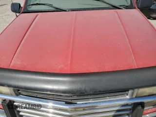 1999 Chevrolet Silverado 3500 z VIN 1GCHC33J3XF055520, wystawiony jako Copart lot #71958374 z przebiegiem 242 976 mil mil oraz Tytuł czysty. Historia ofert i sprzedaży dostępna na DreamBid. Obrazek 11.