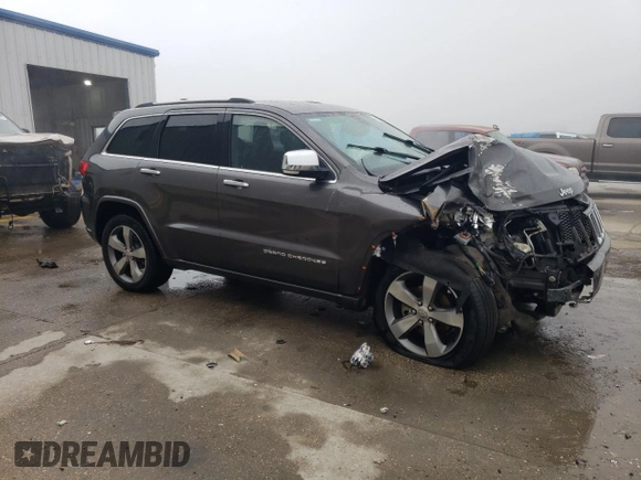 2015 Jeep Grand Cherokee Overland with VIN 1C4RJECT5FC629512, listed as a Copart auction lot 49156905 with 0 mi miles and Salvage Title. Bid and sale history available at carsss.com. Image 4.