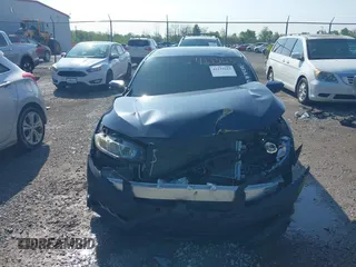 2017 Honda Civic EX-L z VIN 19XFC1F73HE012402, wystawiony jako IAAI lot #42231613 z przebiegiem 73 446 mil mil oraz . Historia ofert i sprzedaży dostępna na DreamBid. Obrazek 13.