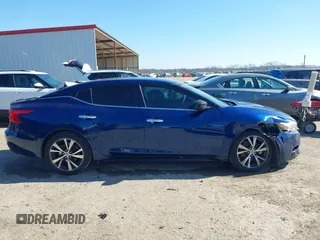 2016 Nissan Maxima SR with VIN 1N4AA6AP6GC398426, listed as a IAAI auction lot 41468260 with 153,716 mi miles and . Bid and sale history available at DreamBid. Image 13.