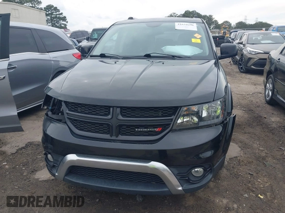 2015 Dodge Journey Crossroad with VIN 3C4PDCGG3FT599771, listed as a IAAI auction lot 41634296 with 76,547 mi miles and . Bid and sale history available at DreamBid. Image 12.