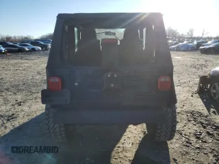 2005 Jeep Wrangler SE with VIN 1J4FA29S95P370542, listed as a Copart auction lot 85571924 with 105,465 mi miles and Salvage Title. Bid and sale history available at carsss.com. Image 6.