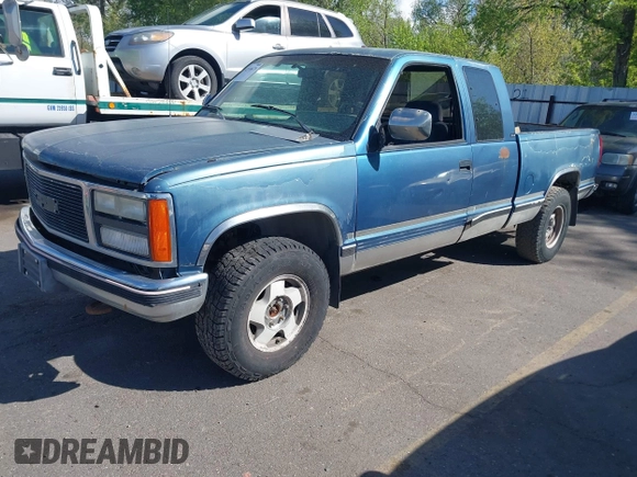 1992 GMC Sierra 1500 z VIN 2GTEK19K1N1520018, wystawiony jako IAAI lot #42116679 z przebiegiem 239 658 mil mil oraz . Historia ofert i sprzedaży dostępna na DreamBid. Obrazek 2.