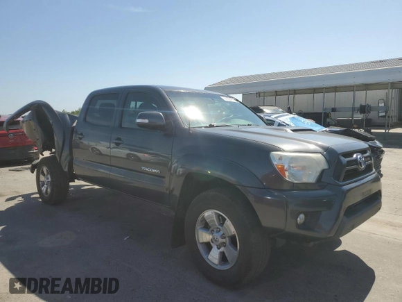 2015 Toyota Tacoma with VIN 3TMMU4FN7FM078006, listed as a Copart auction lot 59129495 with 244,062 mi miles and Salvage title. Bid and sale history available at DreamBid. Image 4.