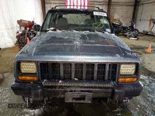 1998 Jeep Cherokee Sport with VIN 1J4FJ68S9WL241184, listed as a Copart auction lot 87360684 with 257,954 mi miles and Clean Title. Bid and sale history available at carsss.com. Image 5.