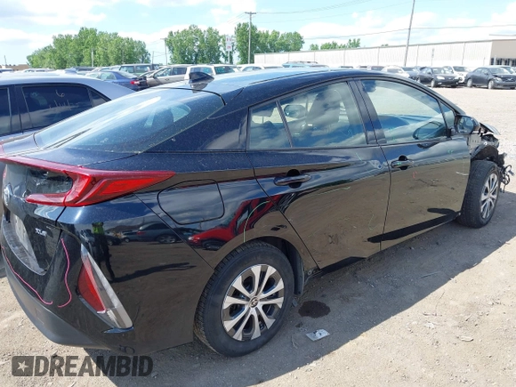 2020 Toyota Prius LE with VIN JTDKARFP3L3156910, listed as a IAAI auction lot 42467826 with 103,285 mi miles and . Bid and sale history available at DreamBid. Image 4.