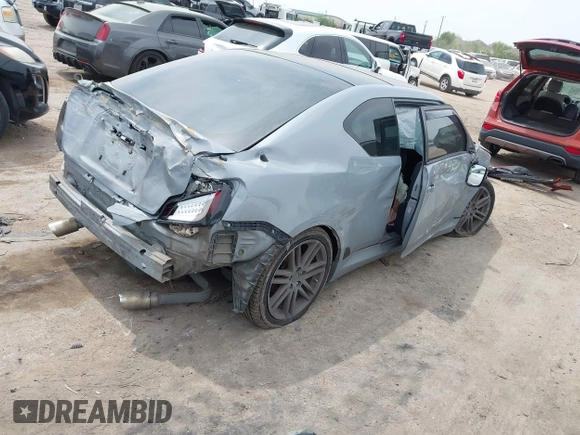 2013 Scion tC with VIN JTKJF5C7XD3046764, listed as a IAAI auction lot 41881930 with 87,701 mi miles. Bid and sale history available at carsss.com. Image 4.