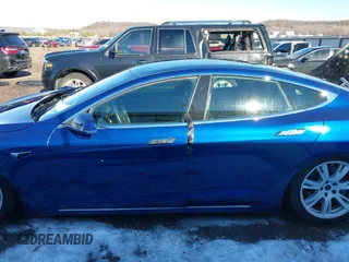 2020 Tesla Model S Long Range with VIN 5YJSA1E26LF410779, listed as a IAAI auction lot 41241192 with 68,764 mi miles and . Bid and sale history available at DreamBid. Image 15.