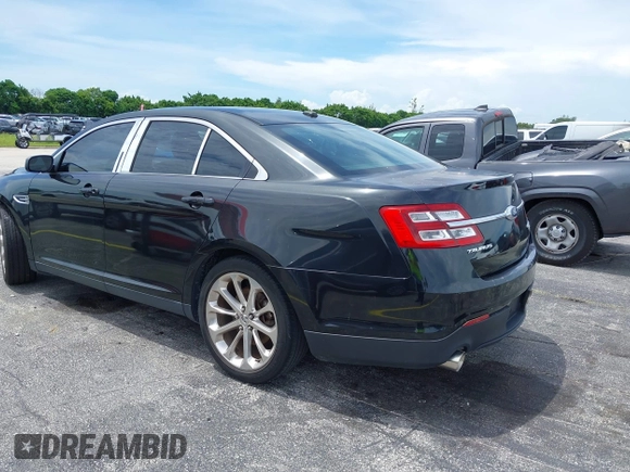 2013 Ford Taurus Limited with VIN 1FAHP2F84DG220283, listed as a IAAI auction lot 40045974 with 155,409 mi miles and . Bid and sale history available at DreamBid. Image 14.