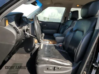 2012 Infiniti QX56 8-passenger with VIN JN8AZ2ND0C9715849, listed as a Copart auction lot 76386714 with 215,768 mi miles and Salvage Title. Bid and sale history available at carsss.com. Image 7.