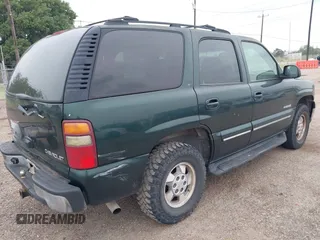 2002 Chevrolet Tahoe LT z VIN 1GNEC13ZX2R279380, wystawiony jako IAAI lot #42324646 z przebiegiem 188 781 mil mil oraz . Historia ofert i sprzedaży dostępna na DreamBid. Obrazek 4.