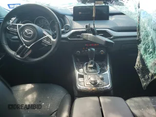 2021 Mazda CX-9 Touring z VIN JM3TCACY5M0500924, wystawiony jako Copart lot #50654505 z przebiegiem 57 067 mil mil oraz Szkoda całkowita • Salvage title. Historia ofert i sprzedaży dostępna na DreamBid. Obrazek 8.