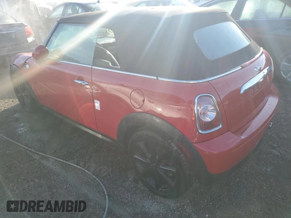 2014 MINI Convertible with VIN WMWZN3C5XET266498, listed as a Copart auction lot 77763074 with 76,680 mi miles and Non repairable. Bid and sale history available at DreamBid. Image 2.