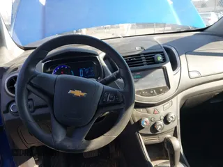 2015 Chevrolet Trax LS with VIN KL7CJKSB4FB086024, listed as a IAAI auction lot 41669572 with 124,312 mi miles. Bid and sale history available at carsss.com. Image 16.