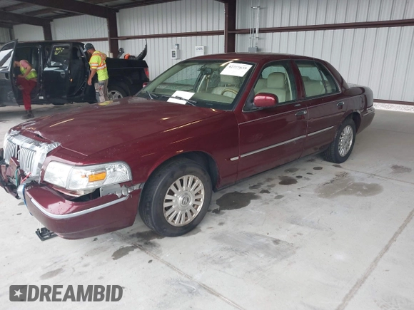 2006 Mercury Grand Marquis LS Premium z VIN 2MEHM75VX6X628404, wystawiony jako IAAI lot #42227639 z przebiegiem 170 132 mil mil oraz . Historia ofert i sprzedaży dostępna na DreamBid. Obrazek 2.