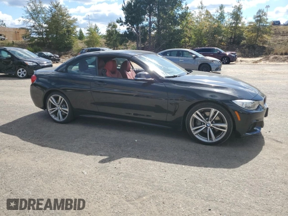 2014 BMW 4 Series 435i with VIN WBA3T3C59EP736749, listed as a Copart auction lot 76011404 with 48,815 mi miles and Salvage title. Bid and sale history available at DreamBid. Image 4.