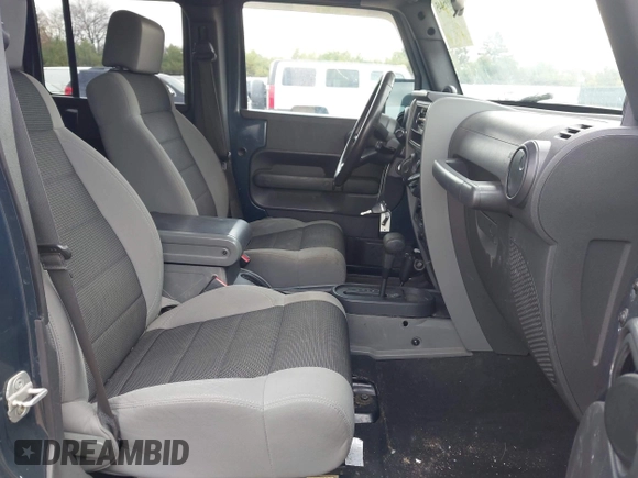 2007 Jeep Wrangler Unlimited X with VIN 1J4GA39137L101321, listed as a IAAI auction lot 42095445 with 243,583 mi miles and . Bid and sale history available at DreamBid. Image 5.