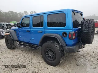 2023 Jeep Wrangler Sport S with VIN 1C4HJXDGXPW692324, listed as a Copart auction lot 41761235 with 15,660 mi miles and Salvage Title. Bid and sale history available at DreamBid. Image 2.