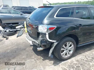 2010 Mazda CX-7 Touring z VIN JM3ER2W30A0341657, wystawiony jako IAAI lot #42123453 z przebiegiem 173 135 mil mil oraz . Historia ofert i sprzedaży dostępna na DreamBid. Obrazek 13.