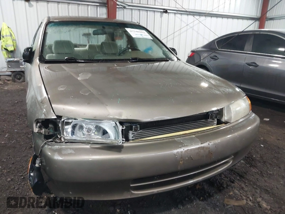 1998 Mazda Protege DX with VIN JM1BC141XW0200689, listed as a IAAI auction lot 41540162 with 172,311 mi miles and . Bid and sale history available at DreamBid. Image 6.