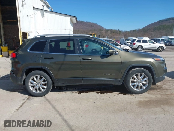 2015 Jeep Cherokee Limited with VIN 1C4PJMDS0FW685749, listed as a IAAI auction lot 41834880 with 161,614 mi miles. Bid and sale history available at carsss.com. Image 14.