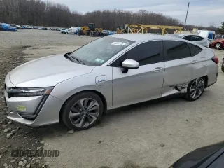 2018 Honda Clarity z VIN JHMZC5F11JC018212, wystawiony jako Copart lot #46850155 z przebiegiem Nie podano mil oraz Szkoda całkowita • Salvage title. Historia ofert i sprzedaży dostępna na DreamBid. Obrazek 1.