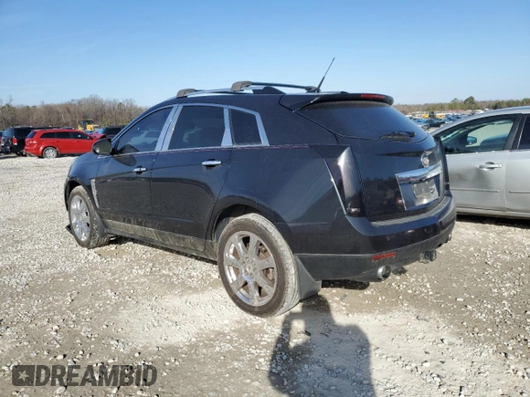 2012 Cadillac SRX Performance Collection with VIN 3GYFNEE32CS562243, listed as a Copart auction lot 42407185 with 26,130 mi miles and Salvage title. Bid and sale history available at DreamBid. Image 2.