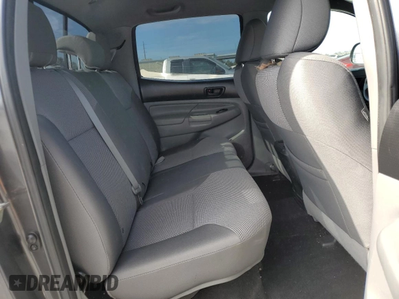 2014 Toyota Tacoma PreRunner with VIN 3TMKU4HN4EM040297, listed as a Copart auction lot 86418894 with 111,626 mi miles and Salvage title. Bid and sale history available at DreamBid. Image 10.