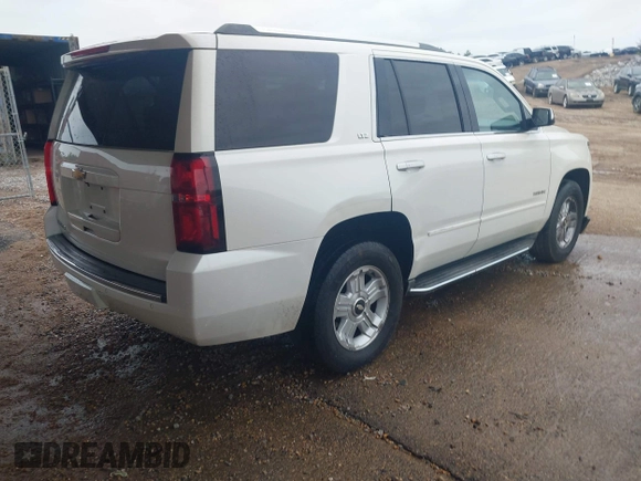 2015 Chevrolet Tahoe LTZ with VIN 1GNSCCKC1FR265370, listed as a IAAI auction lot 42131294 with 217,064 mi miles and . Bid and sale history available at DreamBid. Image 4.